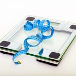 Metabolism Out of Whack? So Are Your Hormones. Scales and tape measure for health and diet